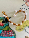 Pearl & leather knotted bracelet