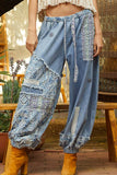 Floral print patchwork twill joger pants: DENIM / L