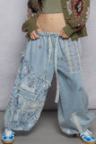 Floral print patchwork twill joger pants: DENIM / M
