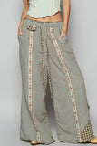Contrast buckle back detail floral trim down woven pants: STRIPE DENIM / S