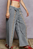 Contrast buckle back detail floral trim down woven pants: STRIPE DENIM / M