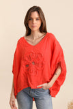 Blouse with a flower in 100% Linen REF. 11209: White