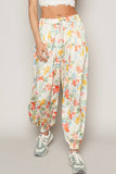 Adjustable string floral print woven harem pants: IVORY MULTI / S