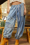 Floral print patchwork twill joger pants: DENIM / S