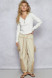Oversized floral pattern printed knit pants: CARAMEL MULTI / L