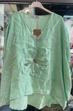 Blouse with a flower in 100% Linen REF. 11209: Light green