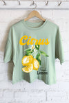 CITRUS FRESH LEMON GRAPHIC LONG CROP TOP: Natural